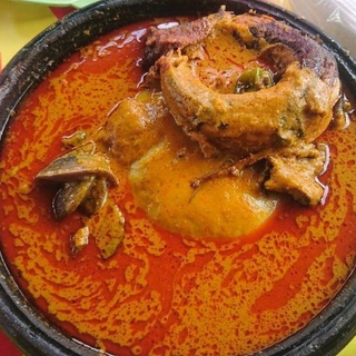 Palm nut soup fish, chicken, cow feet, beef only/ mixed